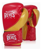 Professional Cleto Reyes hook and loop training and sparring gloves in metallic gold and red graffiti print featuring high-compression padding and the iconic Cleto Reyes logo at PunchPro Boxing.