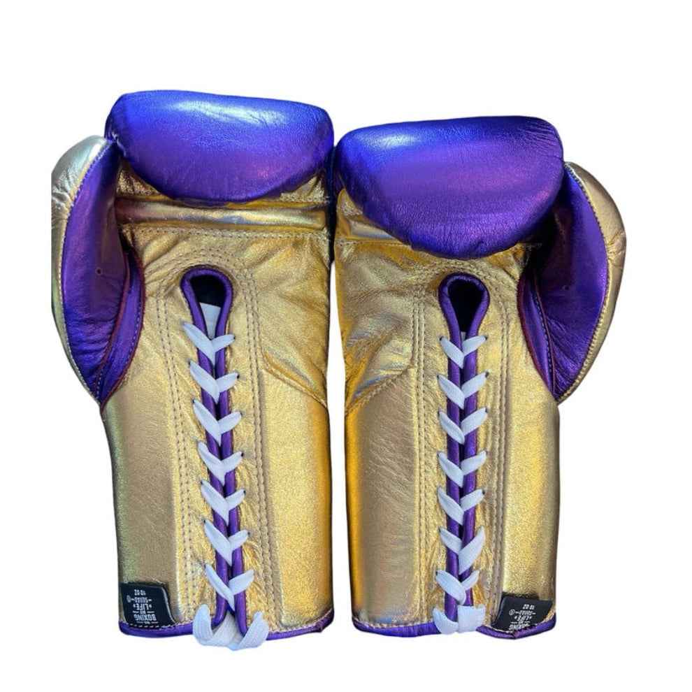 Pair of professional 10 oz No Boxing No Life metallic purple lace-up boxing gloves with metallic gold palms and cuffs featuring "Hecho en Mexico" branding on a white background at PunchPro Boxing.
