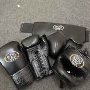 A professional No Boxing No Life sparring set in triple black, featuring matte black lace-up gloves, headguard, and groinguard hand-crafted in Mexico at PunchPro Boxing.