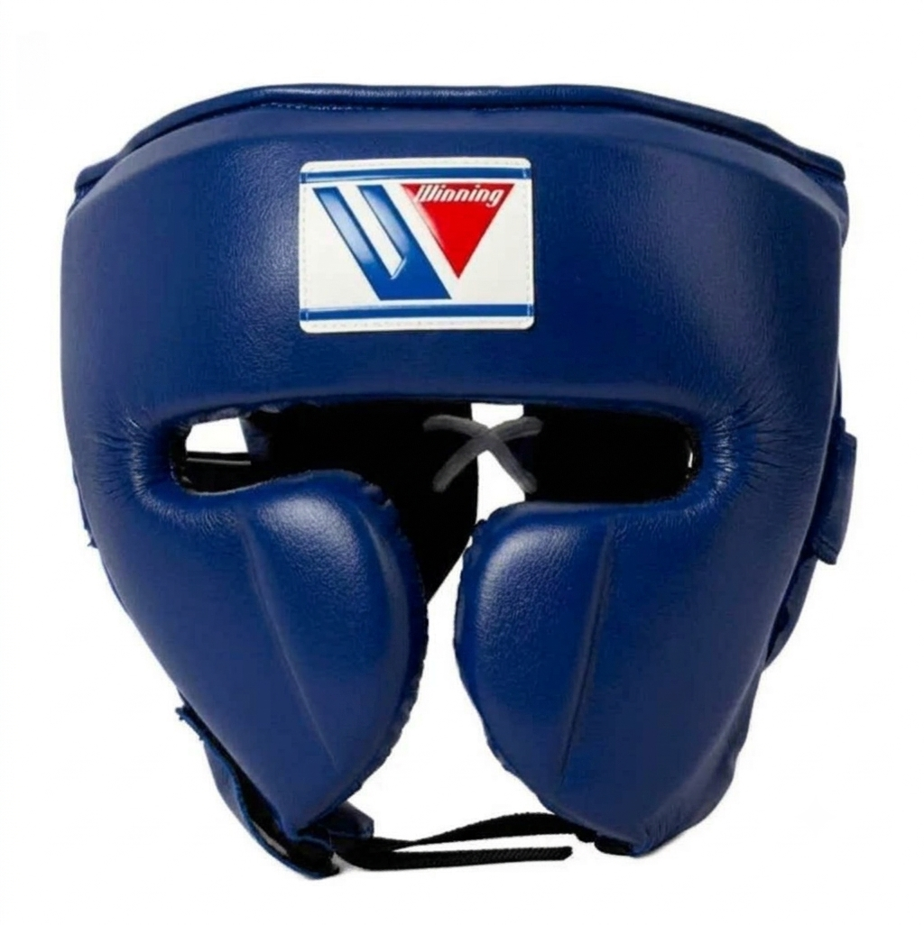 Blue protective boxing headgear with a white, blue, and red Winning logo patch on the forehead, shown against a plain white background.