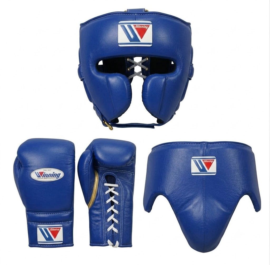 Blue boxing protective gear set including a headguard, gloves, and a waist guard, shown from multiple angles on a white background. The brand logo 'Winning' is visible on the wrist straps and chest pieces.