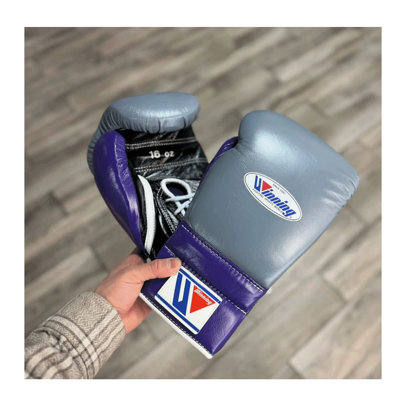 Winning lace-up boxing gloves in grey and purple leather