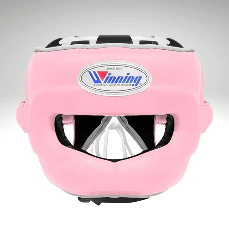 Complete Winning professional baby pink training set including lace-up gloves, FG-5000 headgear with face bar, and CPS-500 groin protector at PunchPro Boxing.