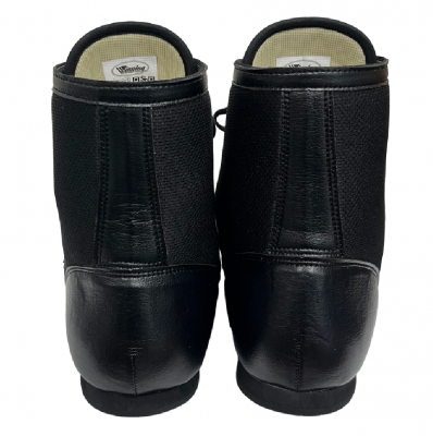 A pair of black leather ankle boots shown from the back, featuring a textured side panel and a smooth leather heel cap, on a white background.