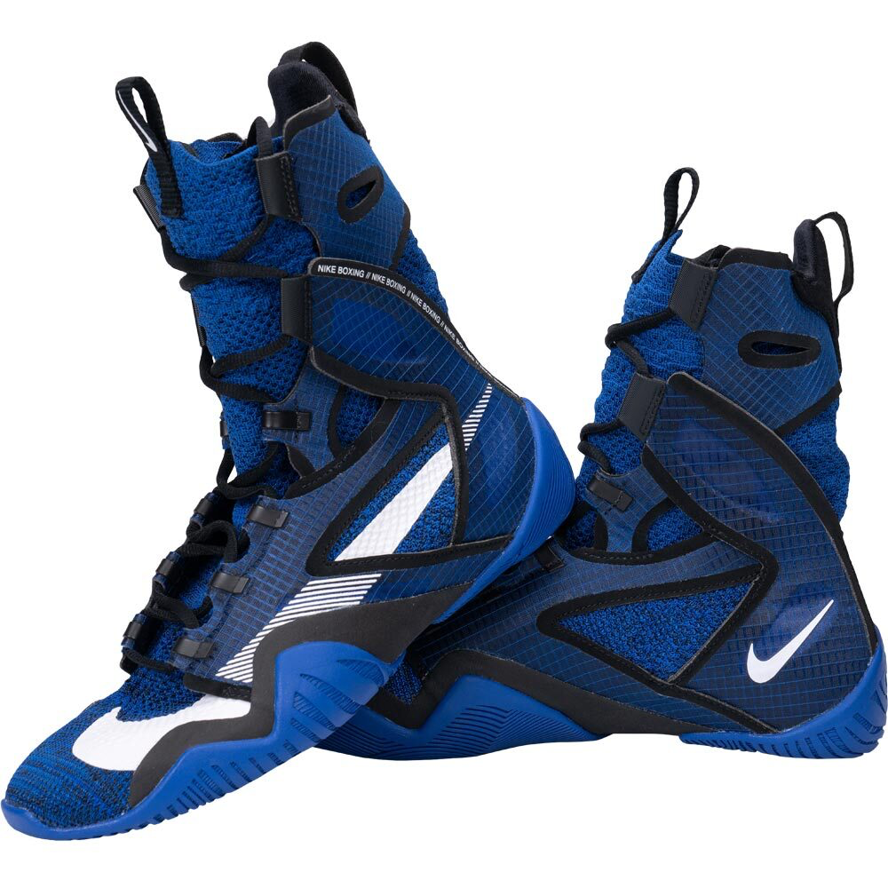 A pair of Nike high-top basketball sneakers in a vibrant blue and black colorway, featuring a white swoosh and white text on the side, set against a plain white background.