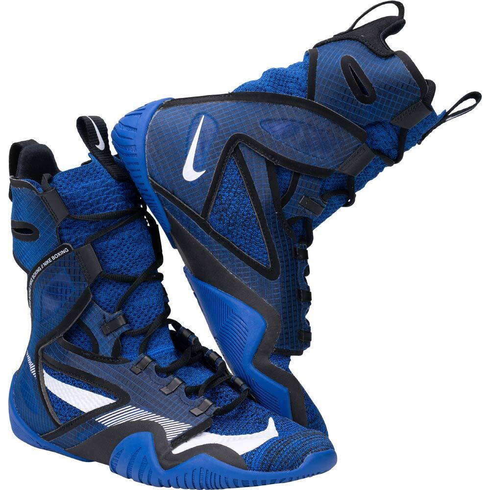 A pair of Nike high-top basketball shoes in royal blue, black, and white, shown against a solid white background.