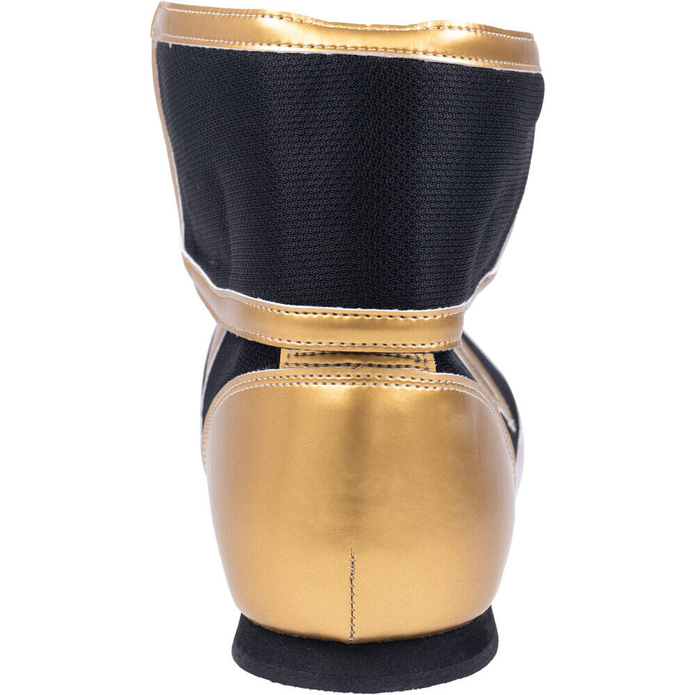 Black and gold high-top boxing shoes, toe box and panelling detail