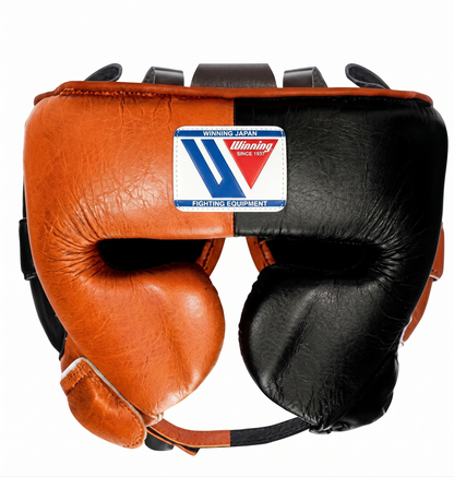 Orange and black split-colour boxing headgear with cheek protection