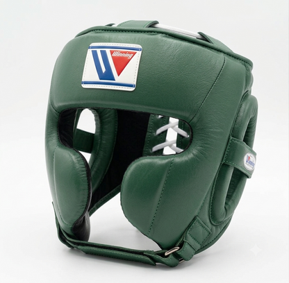 Metallic green boxing headgear with cheek protection and logo patch