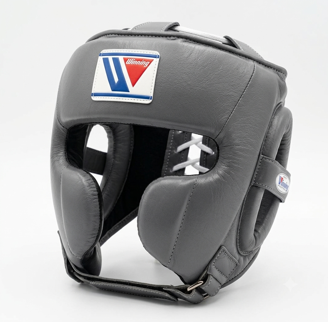 Gray boxing headgear with cheek protection and brand logo patch