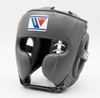 Gray boxing headgear with cheek protection and brand logo patch