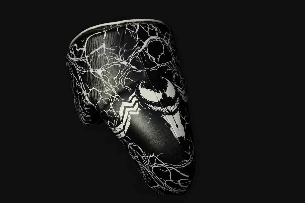 Black and red web-print sparring gloves close-up