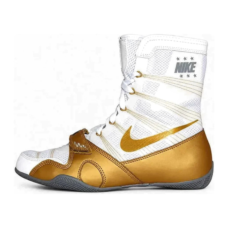 A Custom Nike HyperKO boxing shoe in a white and gold colorway, featuring a gold forefoot lockdown strap and a metallic gold Nike Swoosh