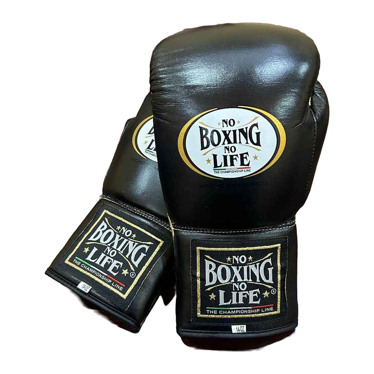 NBNL black and gold gloves knuckle view flat striking surface