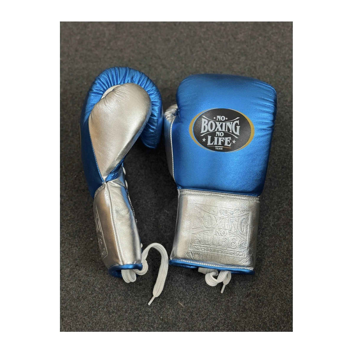 NBNL metallic blue silver gloves side view showing lace-up closure