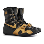 Nike high-top boxing shoes in black and gold with patterned upper, gold Swoosh and gold hook-and-loop strap