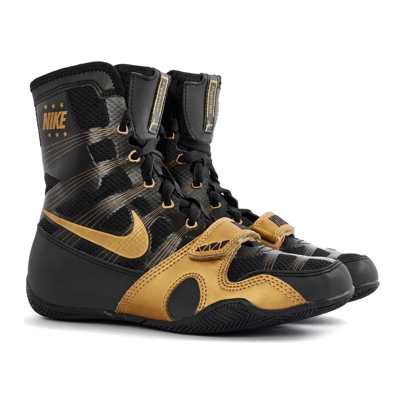 Nike high-top boxing shoes in black and gold with patterned upper, gold Swoosh and gold hook-and-loop strap
