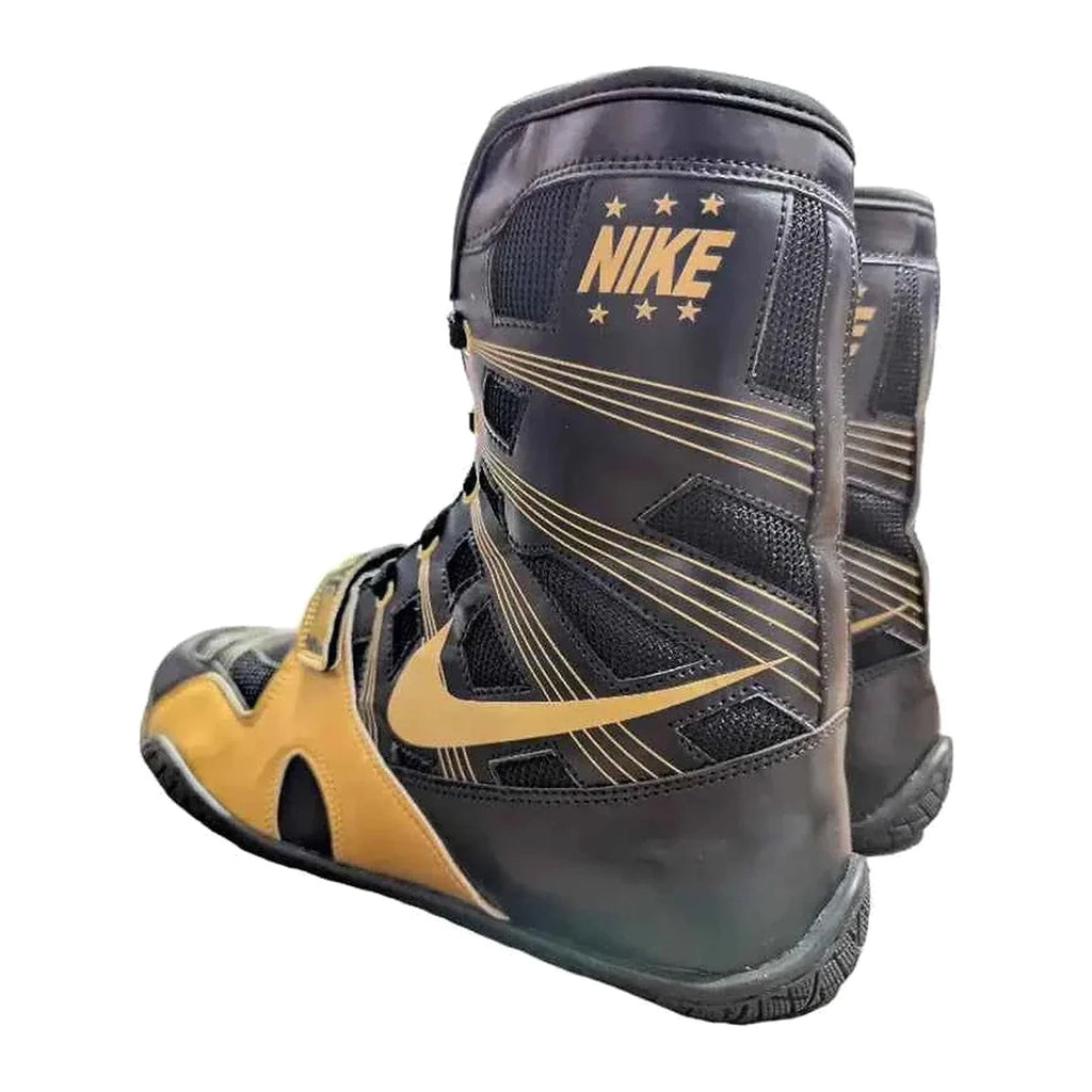 Nike HyperKO 1 boxing boots in black and metallic gold, hook-and-loop forefoot strap detail