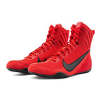 Nike Machomai 2 boxing shoes in red and black, side profile showing mesh panels