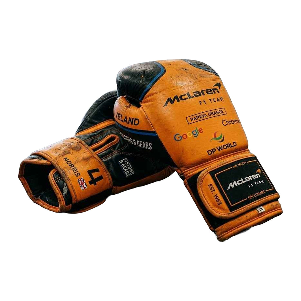 Papaya orange boxing gloves side profile showing wrist cuff