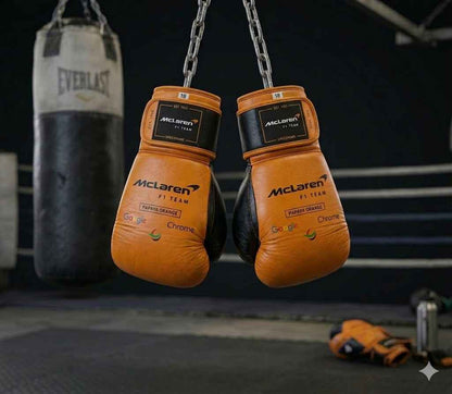 Orange and black boxing gloves knuckle view with contrast panelling