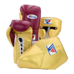 Metallic gold and maroon lace-up boxing training gloves from the sparring set